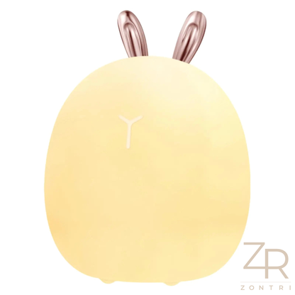 Single rabbit or deer silicone night light photographed on a plain light background to show its simple design.