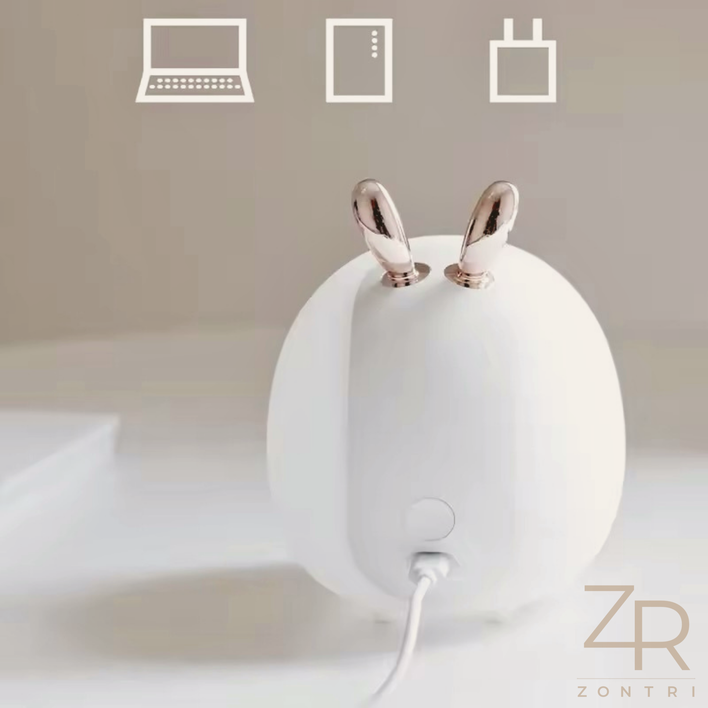 Silicone rabbit night light on a light gray background, featuring charging icons above it and showing charging photo.