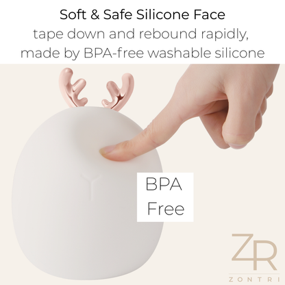 Macro shot showing the soft, flexible BPA-free silicone body of the baby night light.